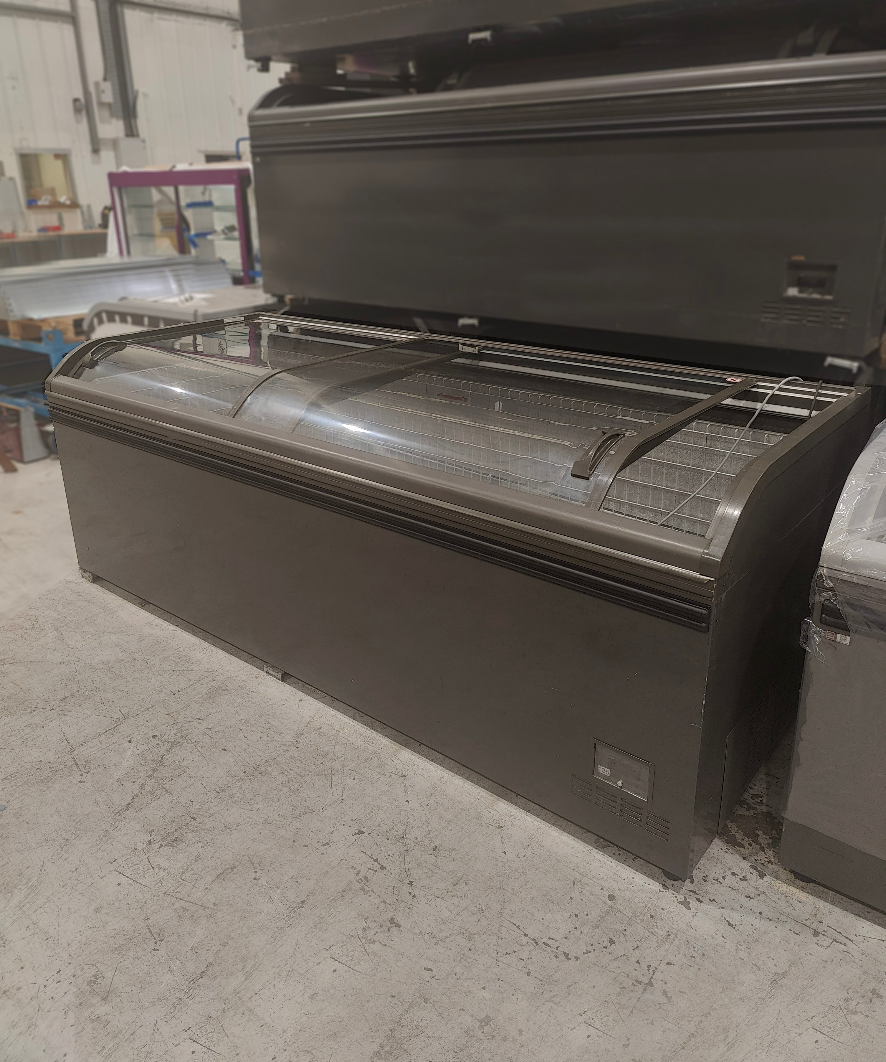 AHT Athens XL chest freezer — angled side view showing full unit length
